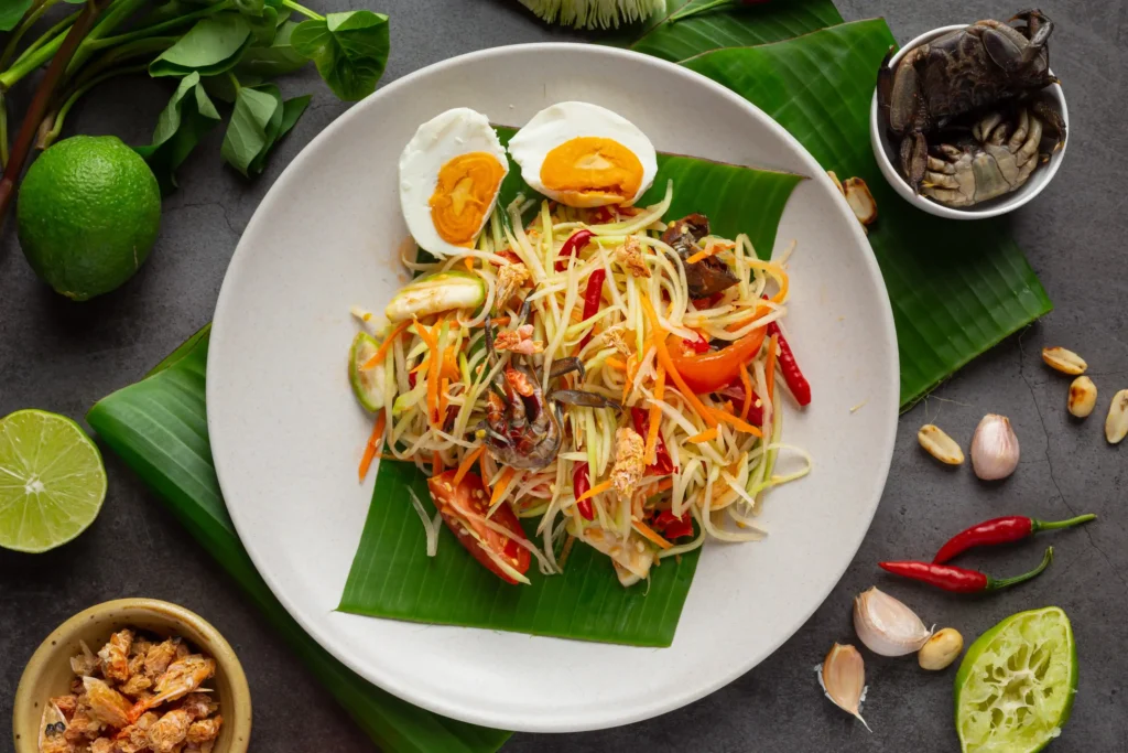 papaya salad served with rice noodles vegetable salad decorated with thai food ingredients 1 Web H