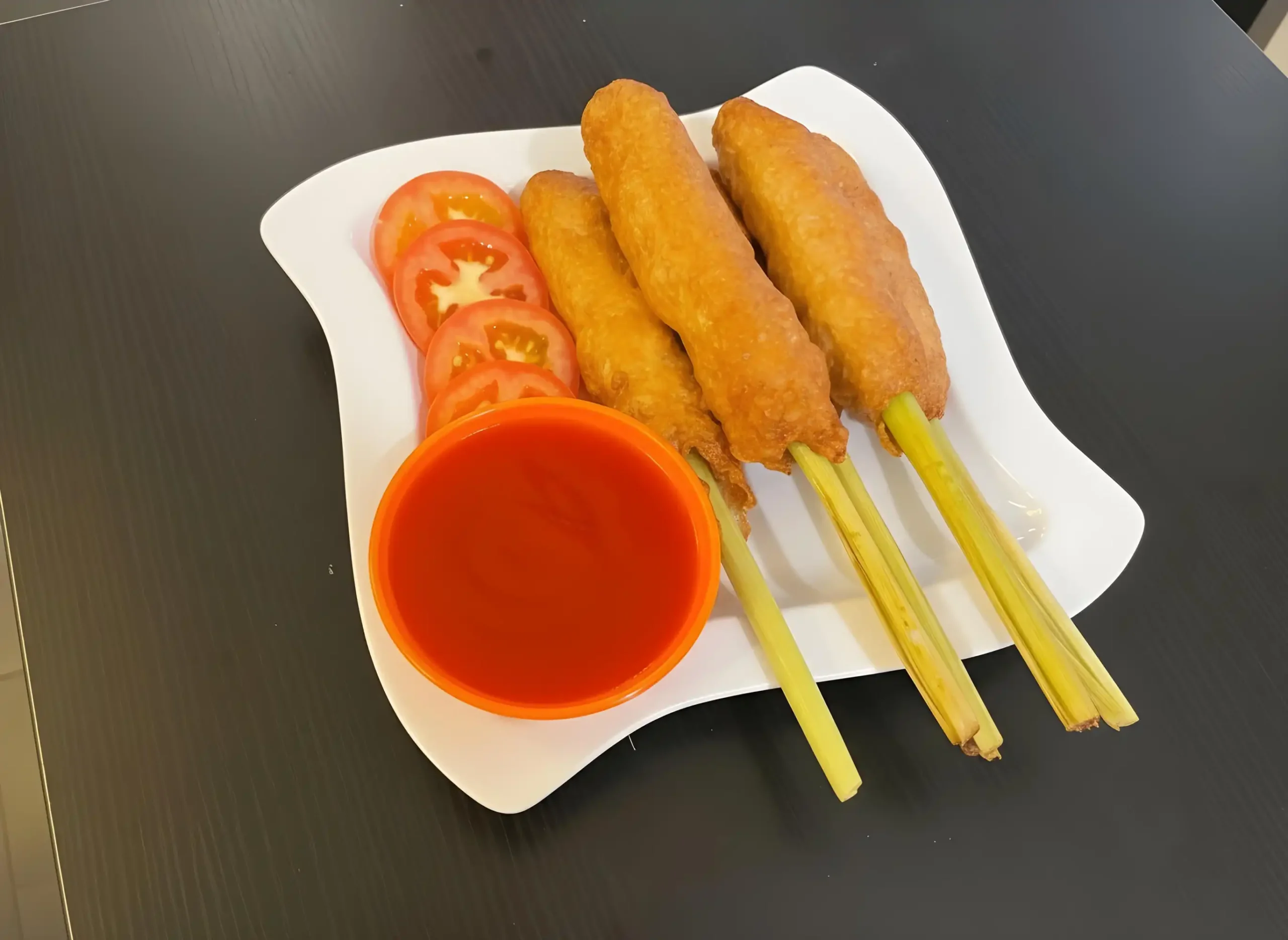 About us 2 Pork wrapped in lemongrass 1 (Web H)